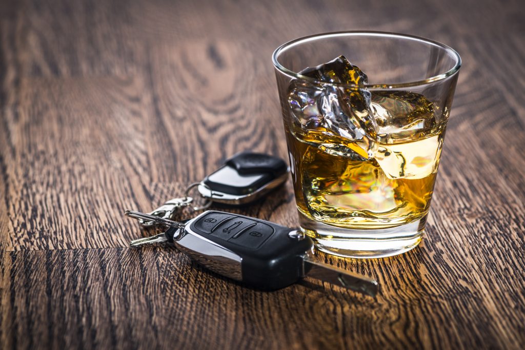 Car keys next to an alcoholic drink - drunk driving accident attorney