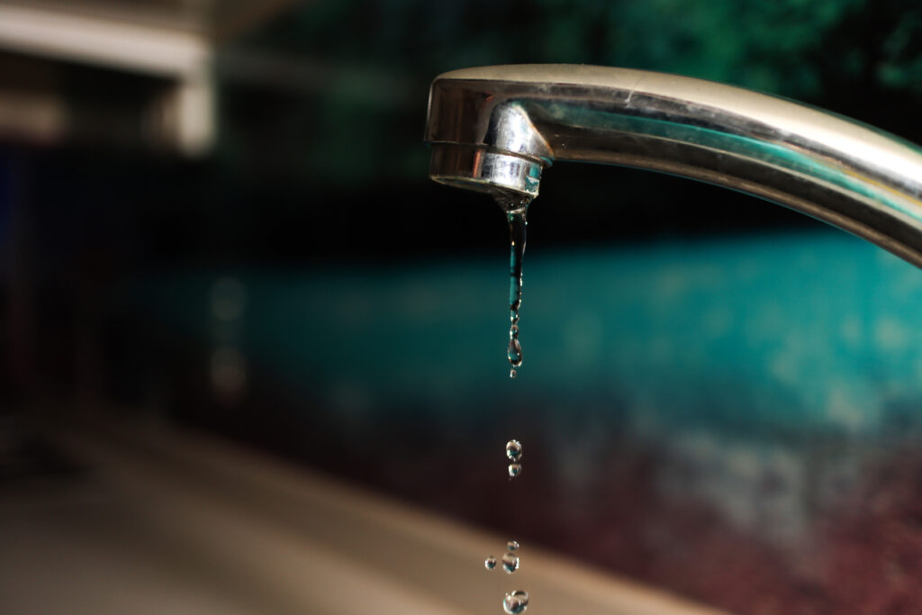 Water dripping from a faucet